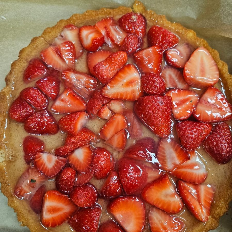 A glazed strawberry tart on a pastry base